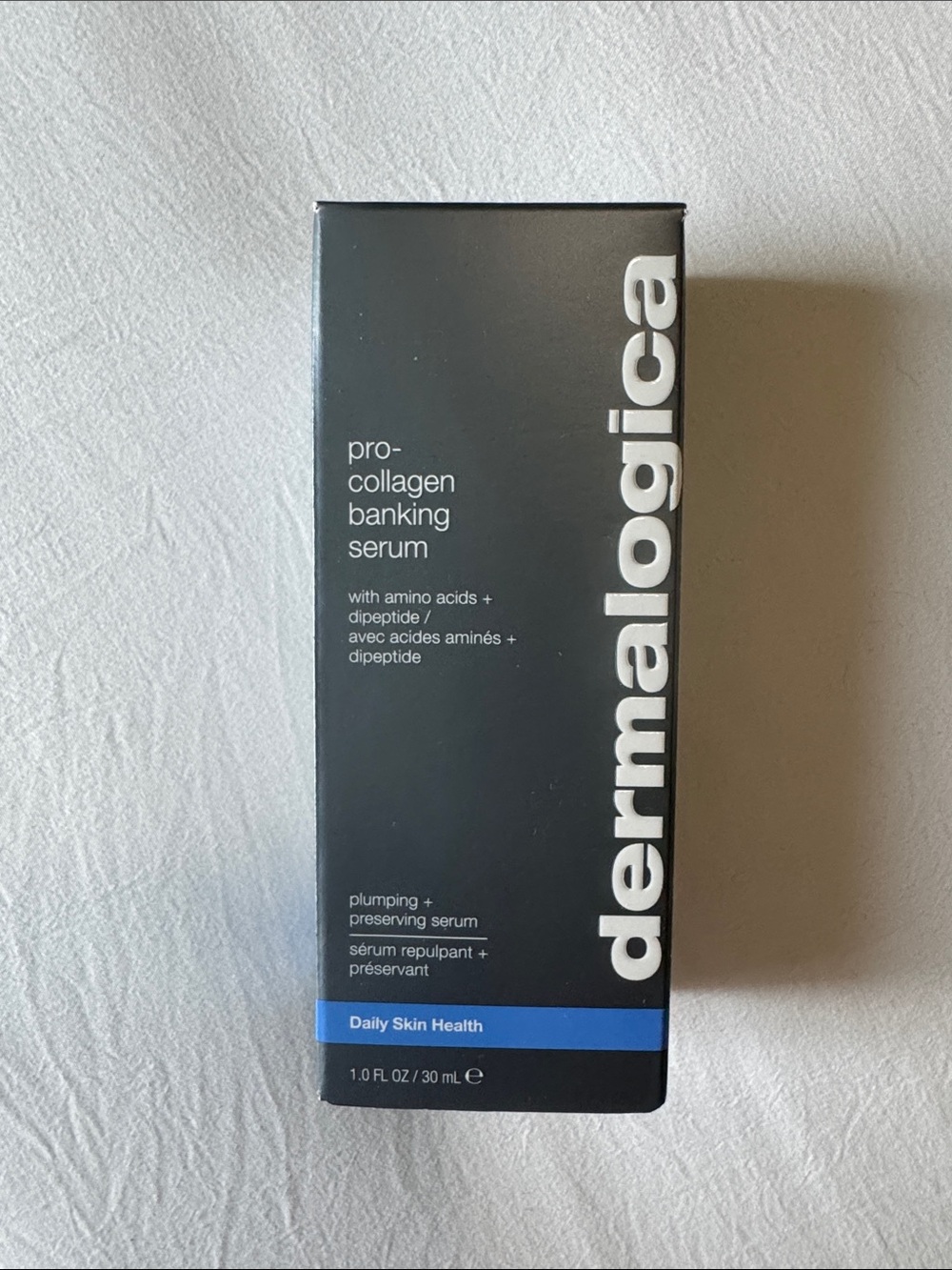 dermalogica Pro-Collagen Banking Serum - Black with Blue Accent